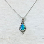 Sterling Silver Rimmed Blue Created Opal Necklace