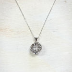 Sterling Silver Open Circle Flower Pendant Necklace with CZ Stones