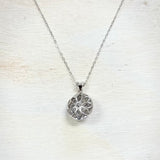 Sterling Silver Open Circle Flower Pendant Necklace with CZ Stones